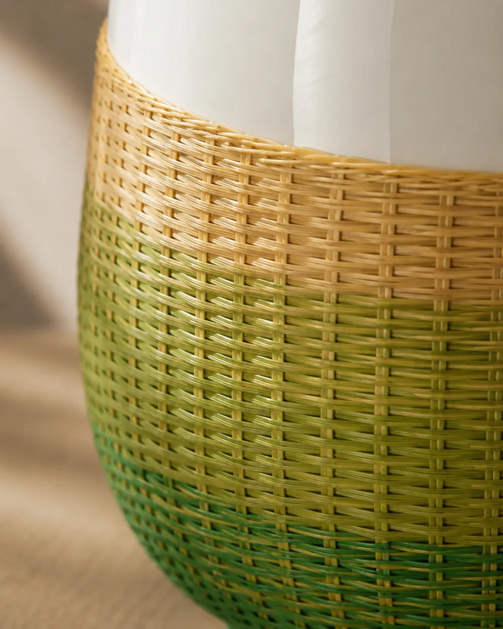 Close-up detail of handwoven bamboo strips paired with smooth Dehua white porcelain, highlighting traditional craftsmanship and natural materials.