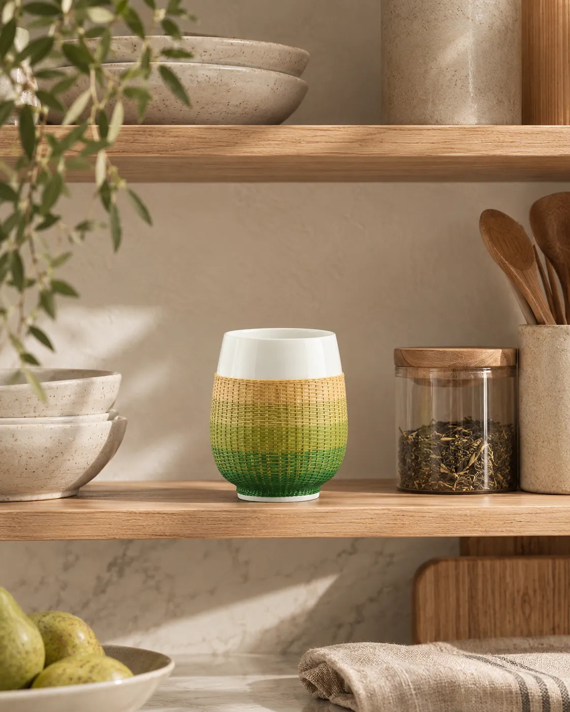 Bamboo over porcelain cup used during a quiet morning ritual, combining handcrafted materials with everyday moments.