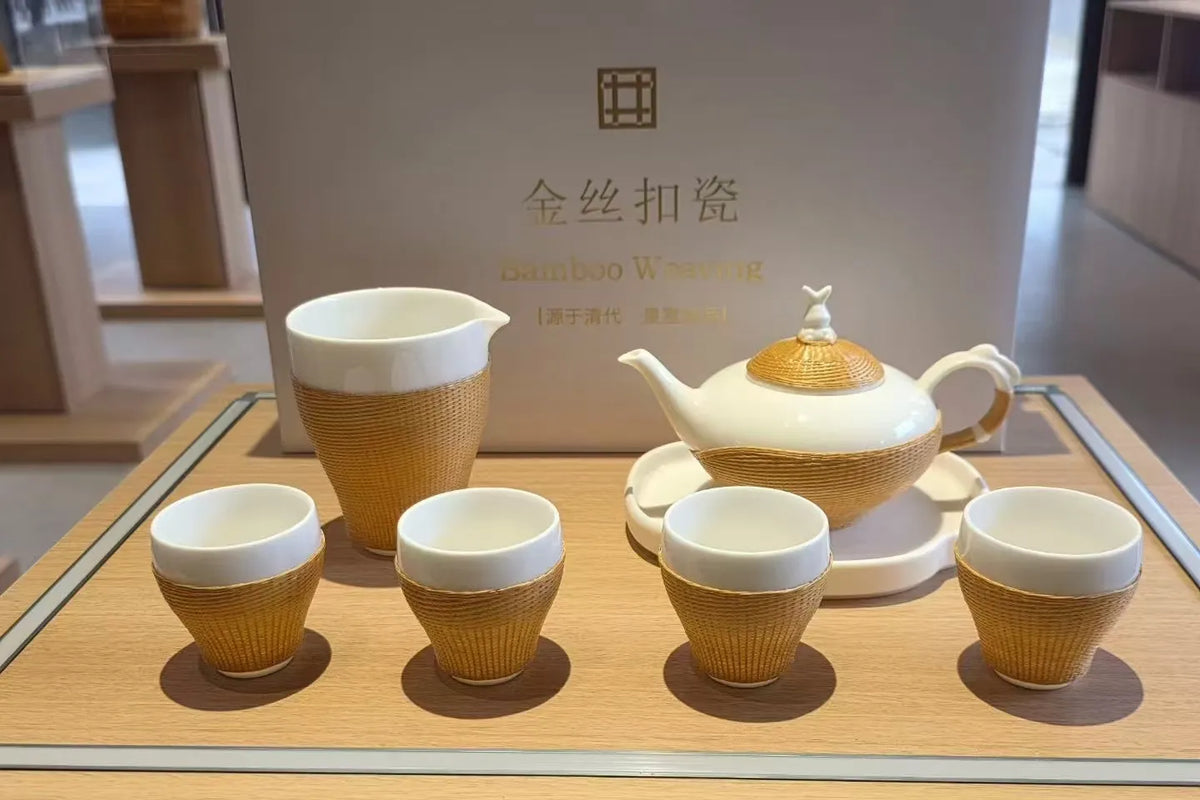A porcelain tea set wrapped in finely handwoven bamboo.